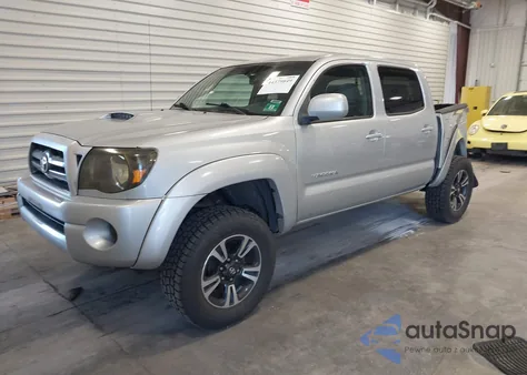 2009 Toyota Tacoma Base V6 из США, поврежденный, VIN 3TMLU42N39M023056